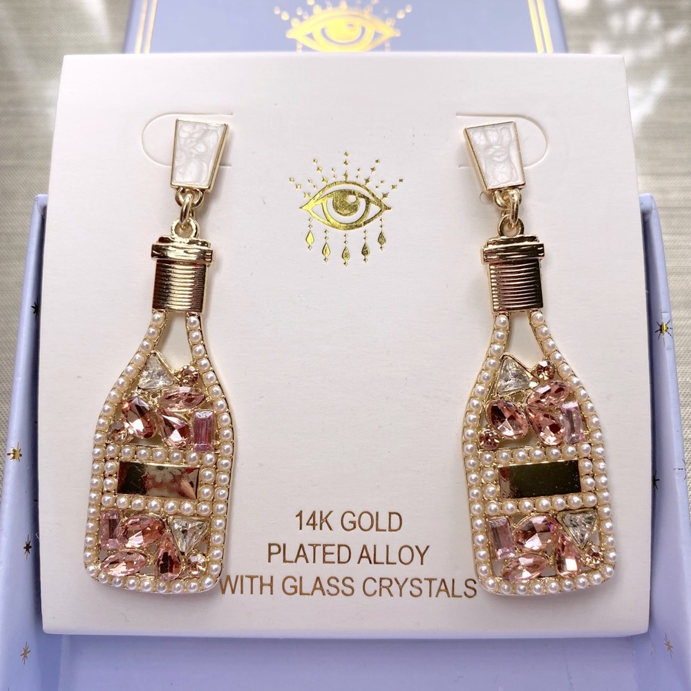 Eye Candy BRAND NEW gold toned earrings with crystal 🥰 Box included 🎁